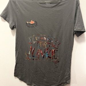 Get ready for fall in the adorable Pumpkin spice junkie t-shirt.